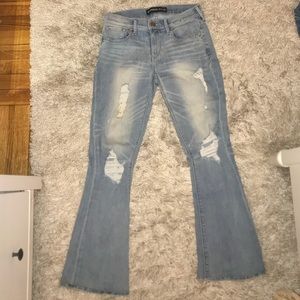 Express slim flare mid rise ripped jeans